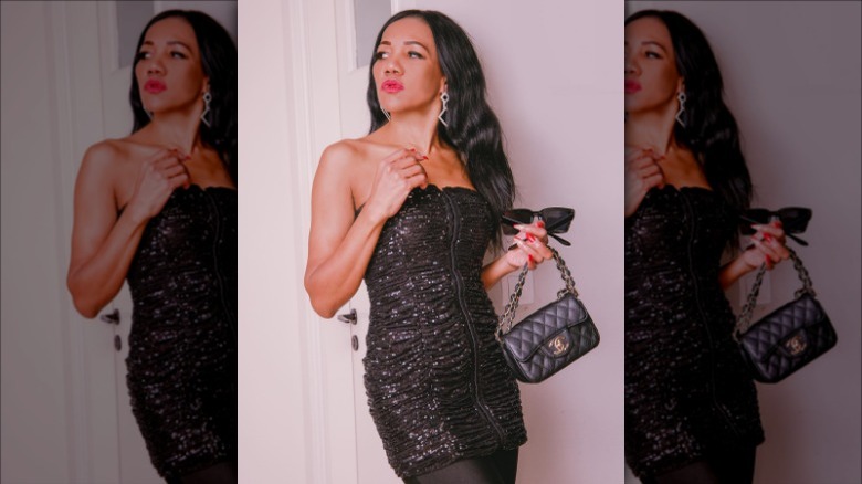 woman wearing sparkly black dress