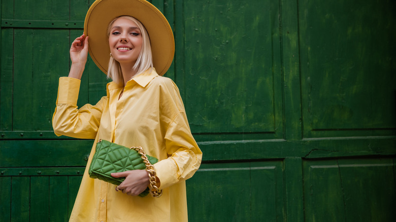woman wearing monochromatic yellow outfit