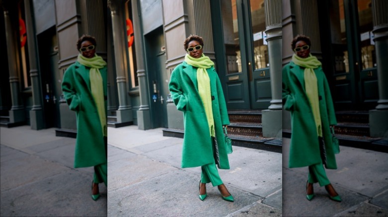 woman wearing green outfit