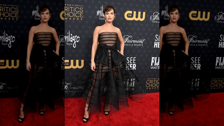 lily james wearing sheer black dress