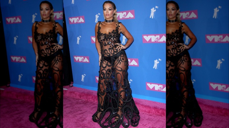 rita ora wearing sheer black dress
