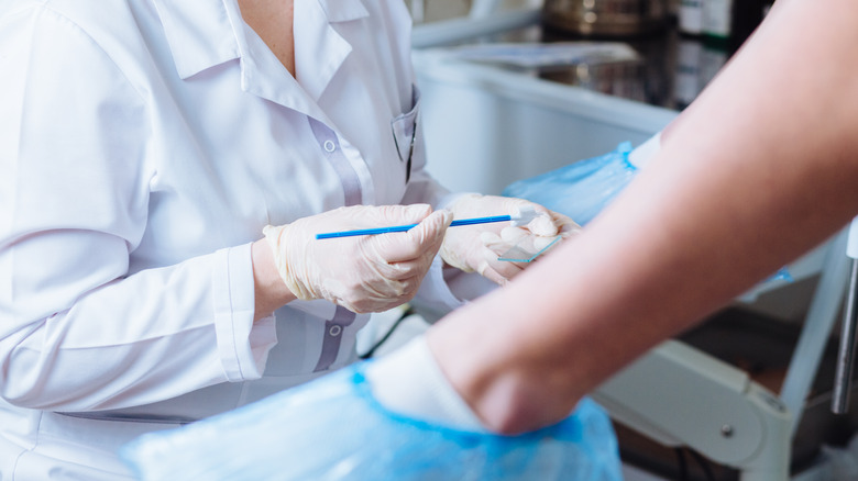 woman preparing for a pap smear
