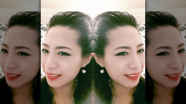 woman with voluminous slicked hair