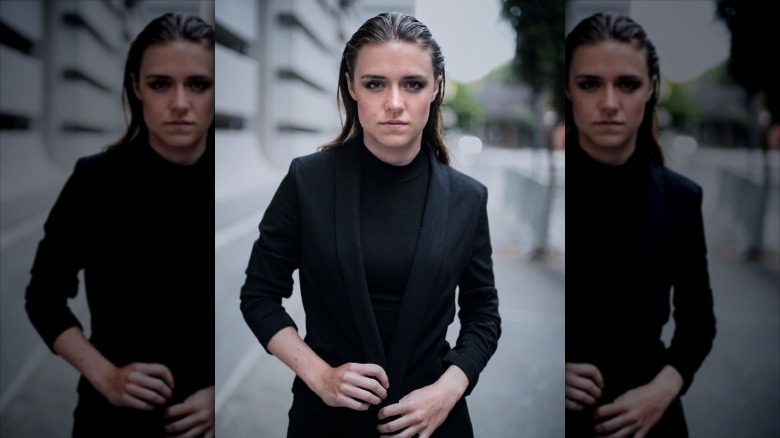 woman with slicked back hair