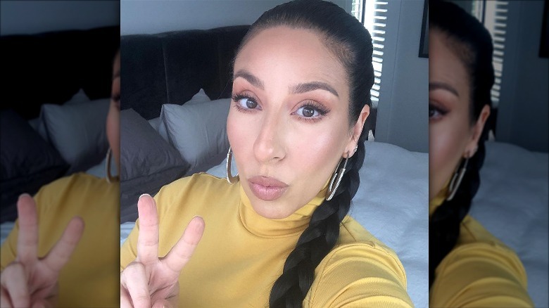 woman with slicked back braid