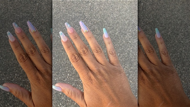 woman with seashell nails