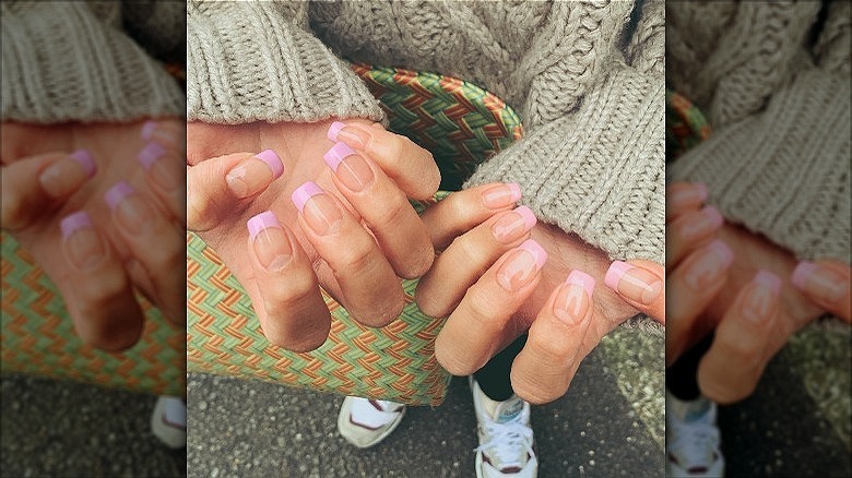 woman with pink pastel french tips