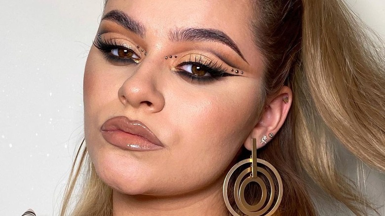 Cut-crease black makeup look