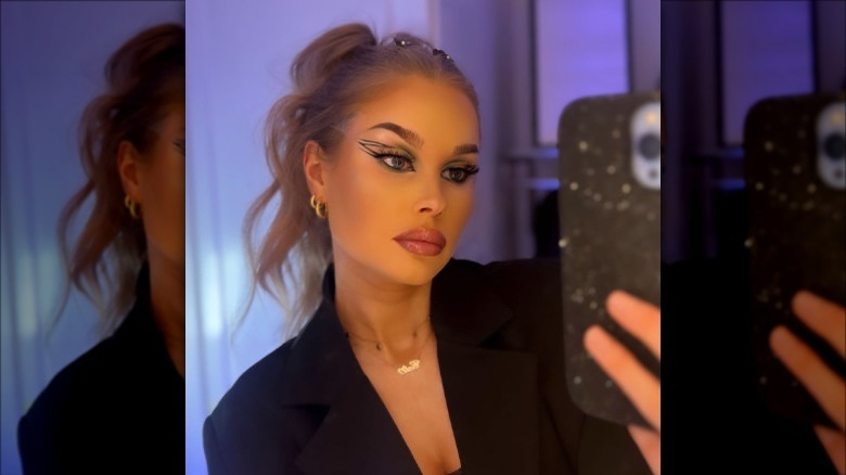 woman with black winged graphic eyeliner