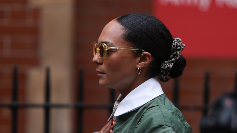 woman with scrunchie on low bun