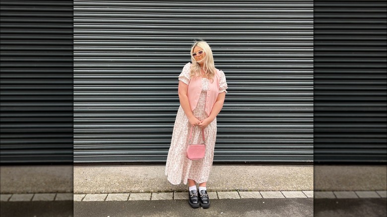 woman in waistcoat over summer dress