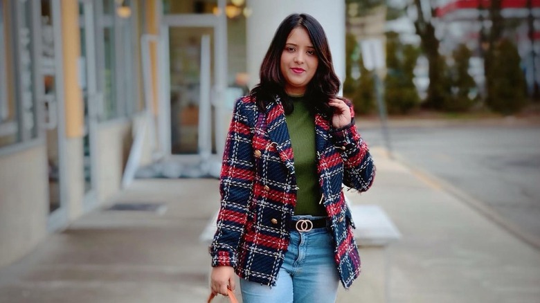woman in plaid coat