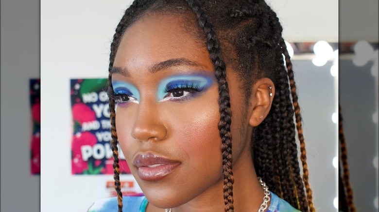 A woman with blue eyeshadow