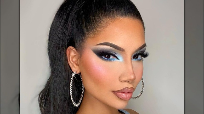 A woman with blue inner corners