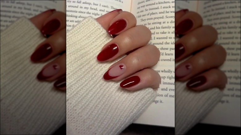 hand with red french accent nail