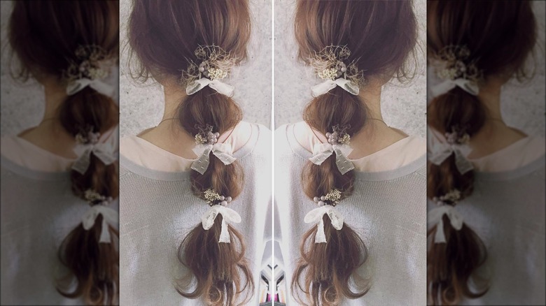 woman ponytail brunette hair