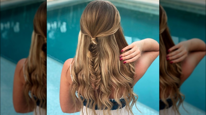 woman with half up fishtail braid