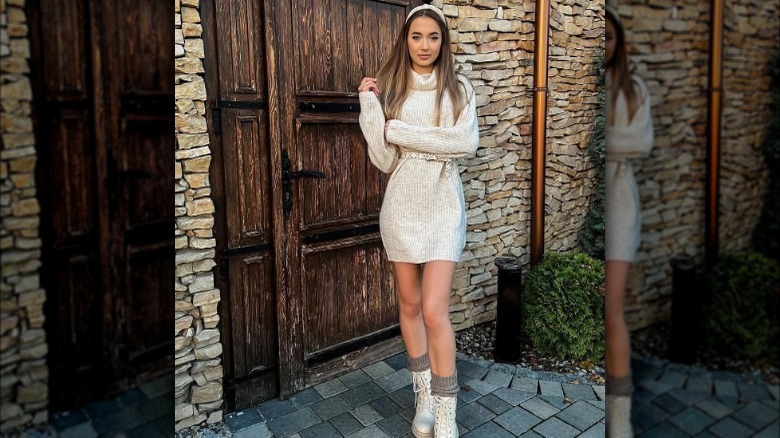 Woman wearing mini dress waist belt