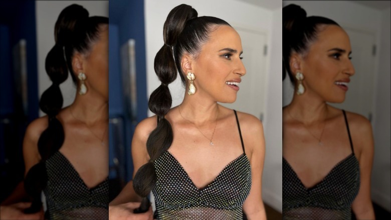 Woman with high bubble ponytail