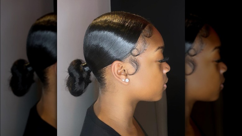 Woman with a low bun