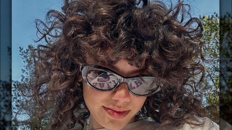 Woman with voluminous shag haircut