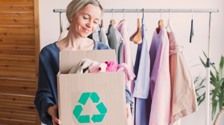 woman cleaning closet