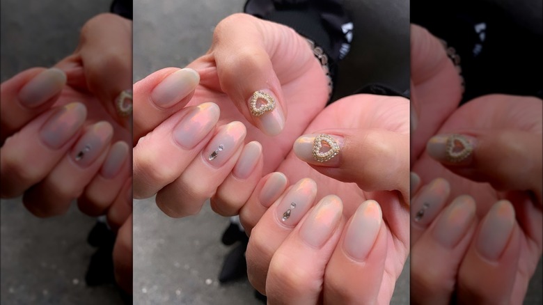 Chrome manicure with jewel stickers