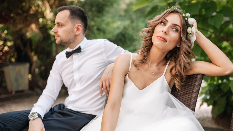 Bride looking away from groom