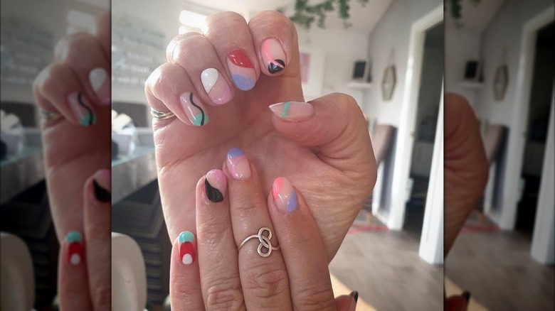An art-deco manicure with multicolored nails