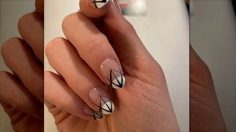 An art-deco manicure with black-and-white nails