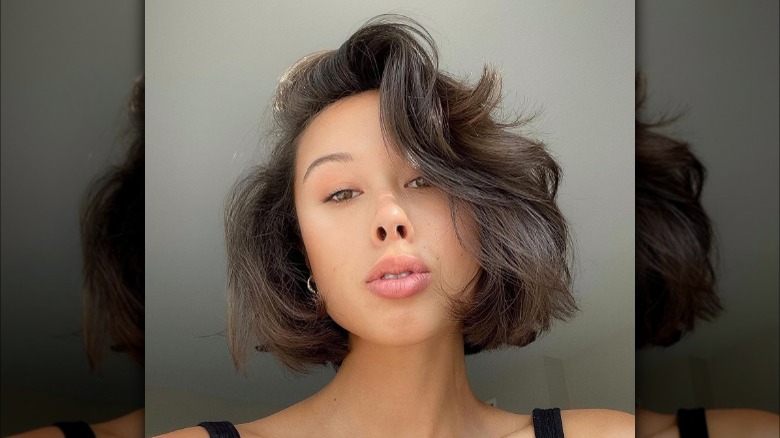 Bob haircut with deep side part