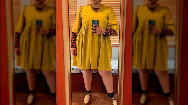 Woman in a yellow mini dress