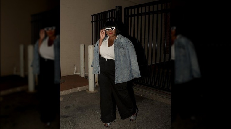 Plus-size woman black pants denim jacket