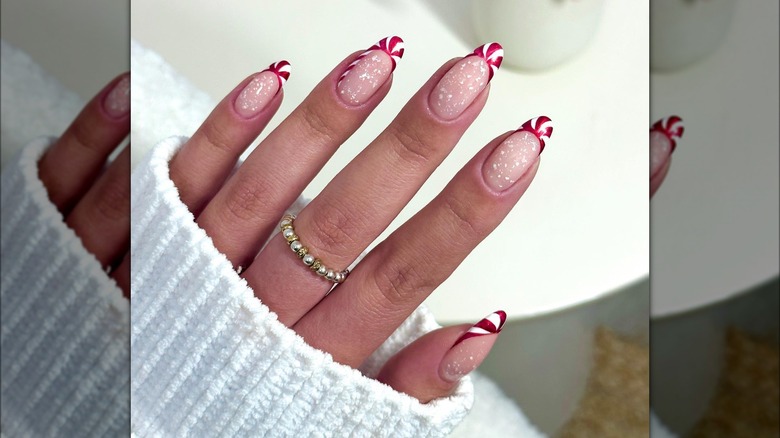 Bright red candy cane nails