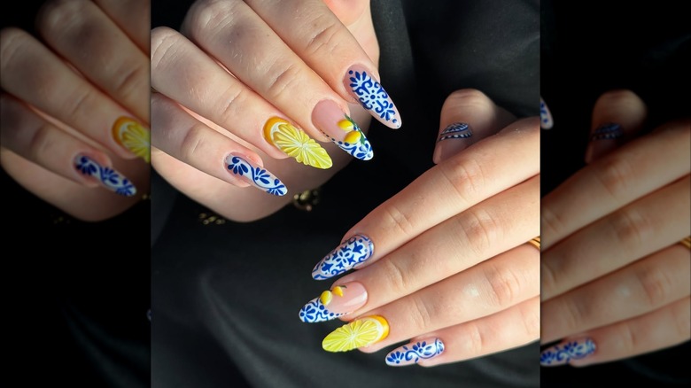 A blue and yellow nail art design.