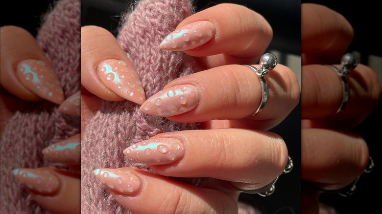 A water droplet nail art design.