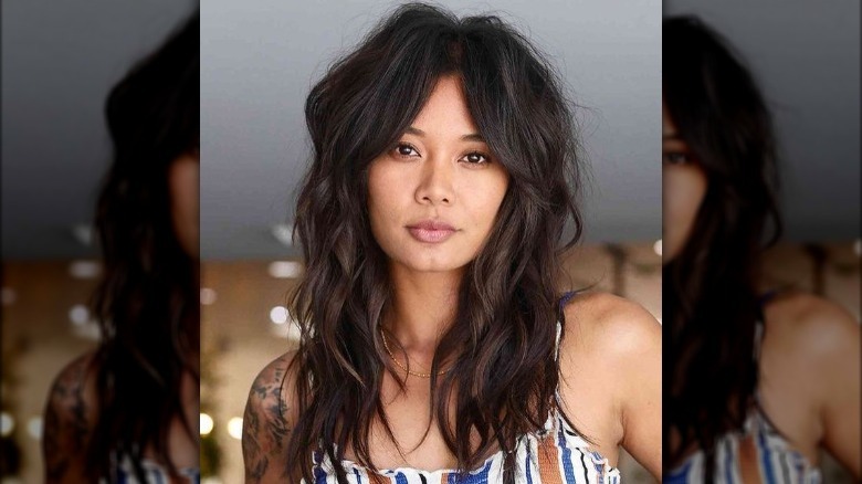 woman with long brown shag