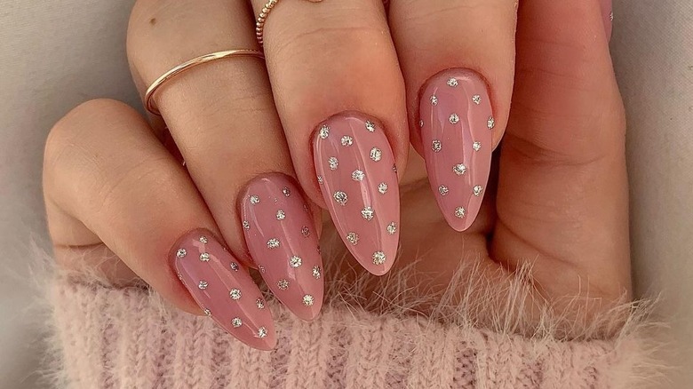 Glittering polka dot manicure