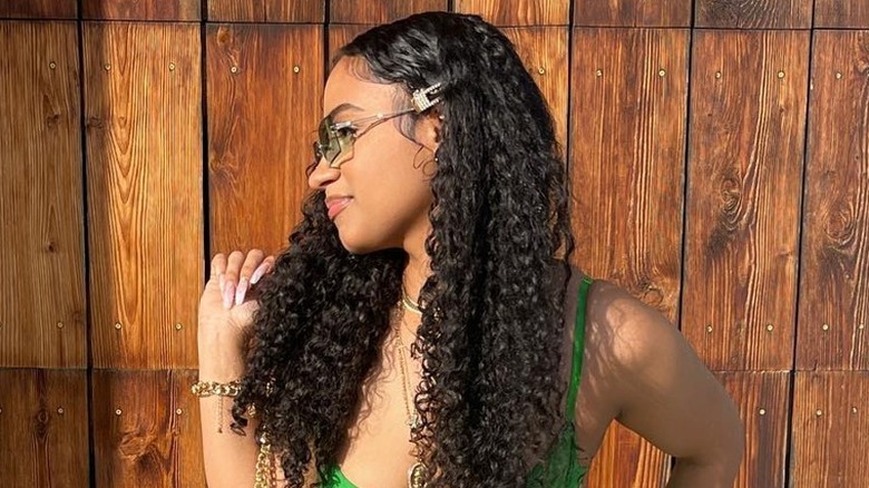 woman wearing barrette in curly hair