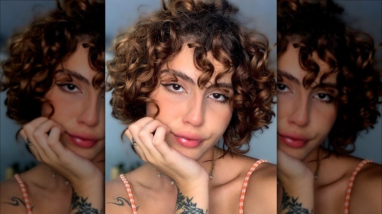 woman with short curly french bob