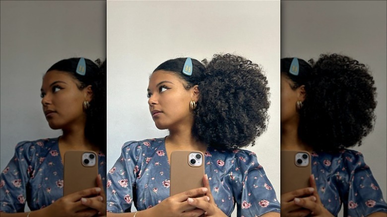 woman with short curly puff hair
