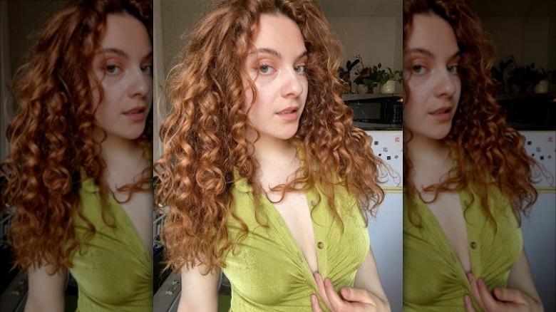 woman with long curly red hair