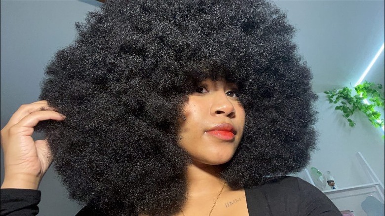 woman with big curly afro