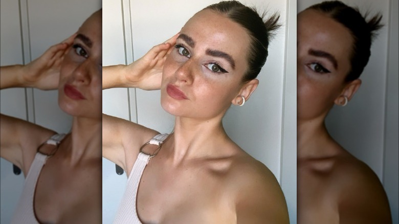 Woman with a sleek bun