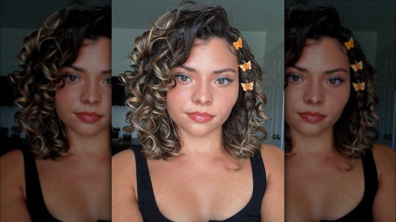 Woman with butterfly clips in hair