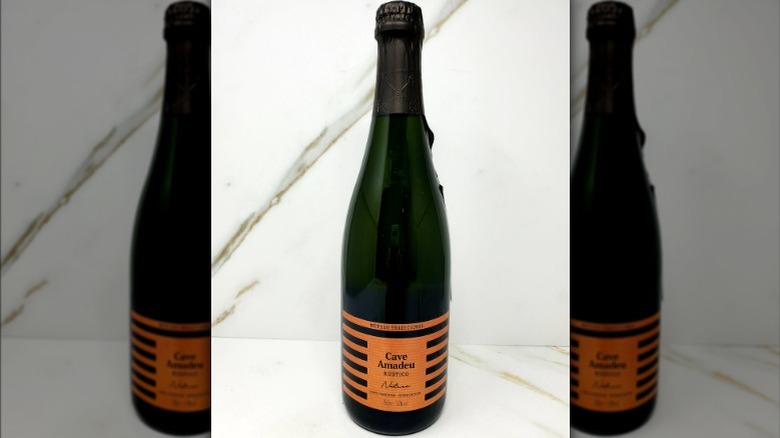 Orange and green wine bottle