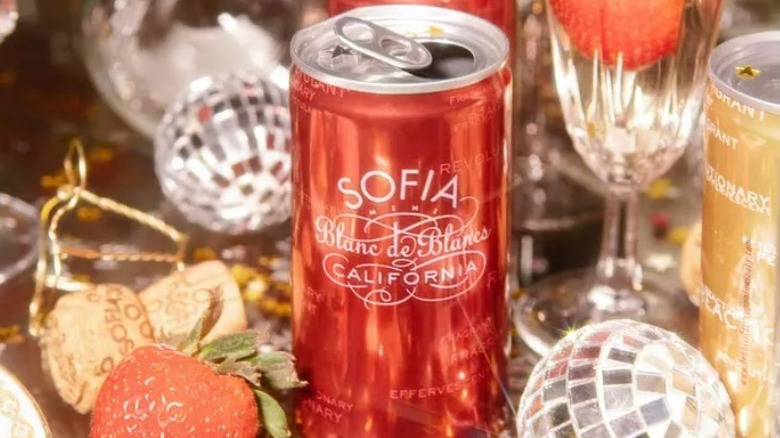 Pink or red can on table