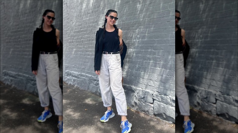 A woman wearing ivory baggy jeans