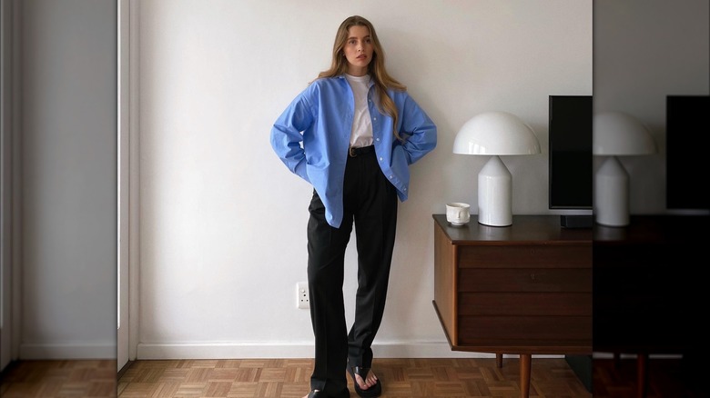 woman wearing blue button down