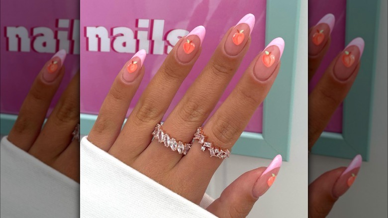 Peach emoji nails